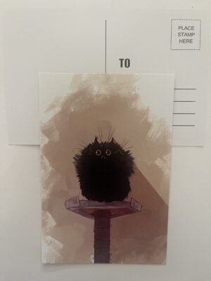 Cat on a scratching post